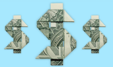 dollar bills folded into dollar signs